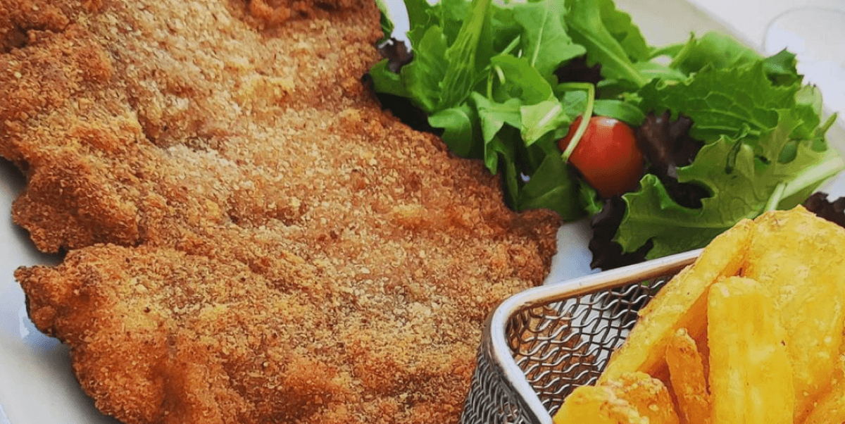 Milanese Style Veal Cutlet, French Fries - Pulcinella | Traditional Italian Pizza Delivery in Monaco